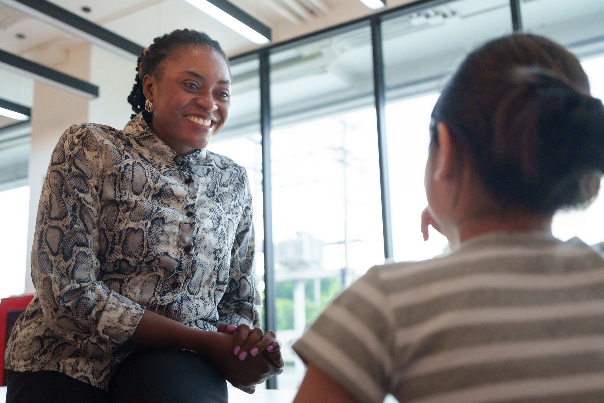 teacher speaking with student